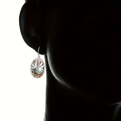 Минђуше са шкољком морског уха – симбол обнове и милости 