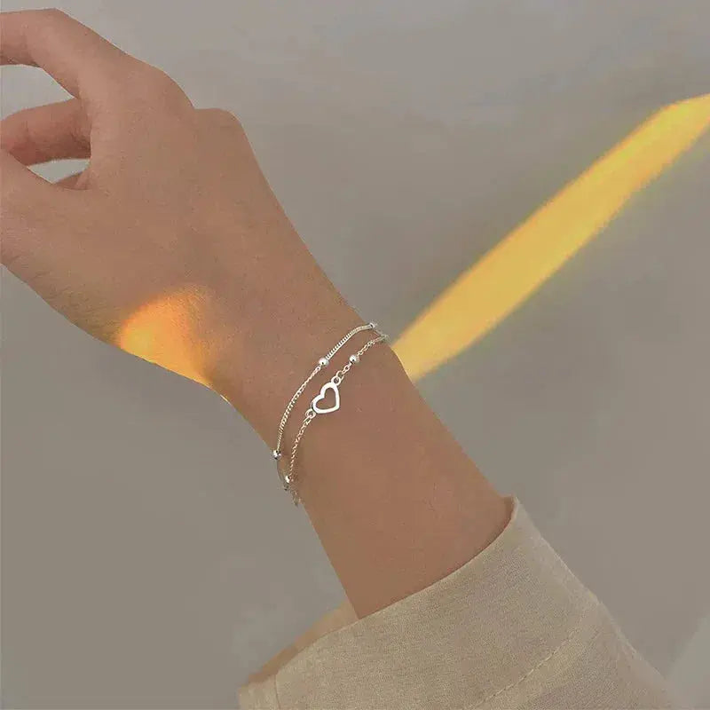 Подесива сребрна наруквица са срцем