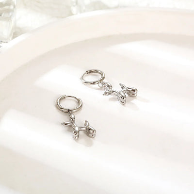 Златне минђуше са мини привеском за пса у облику балона