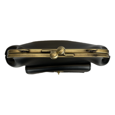 Винтиџ Kiss-Lock торба – неопходан модни детаљ у ретро стилу