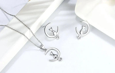 Сребрне минђуше са мачком и Месецом